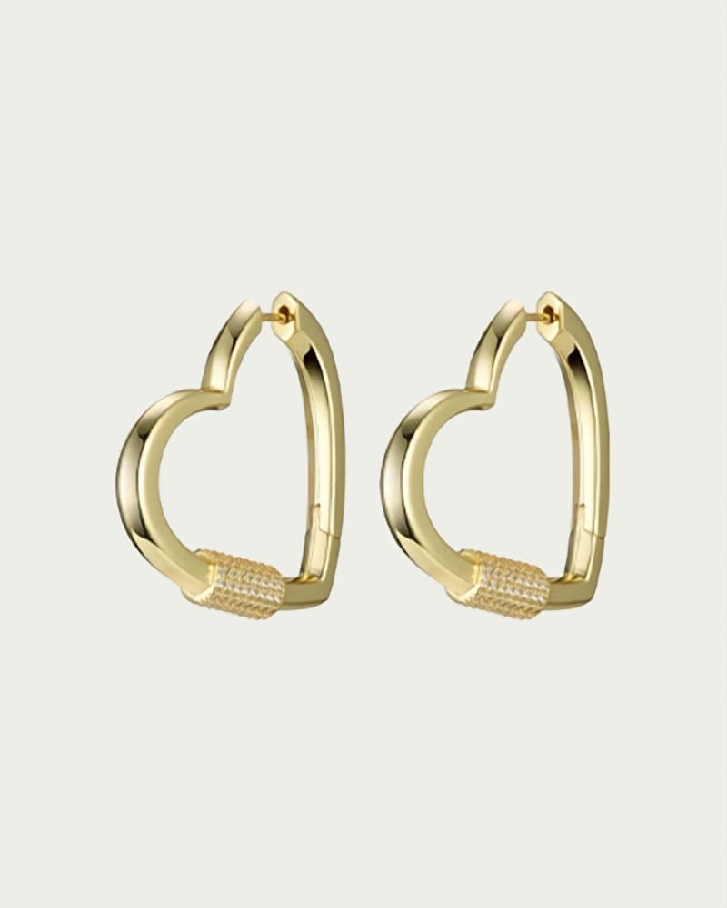 Front of a size O/S Hardcore Love Heart Statement Earrings in Gold/Clear in Gold/Clear by F+H Studios. | dia_product_style_image_id:329898